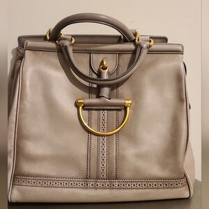 Gucci handbag in gray.